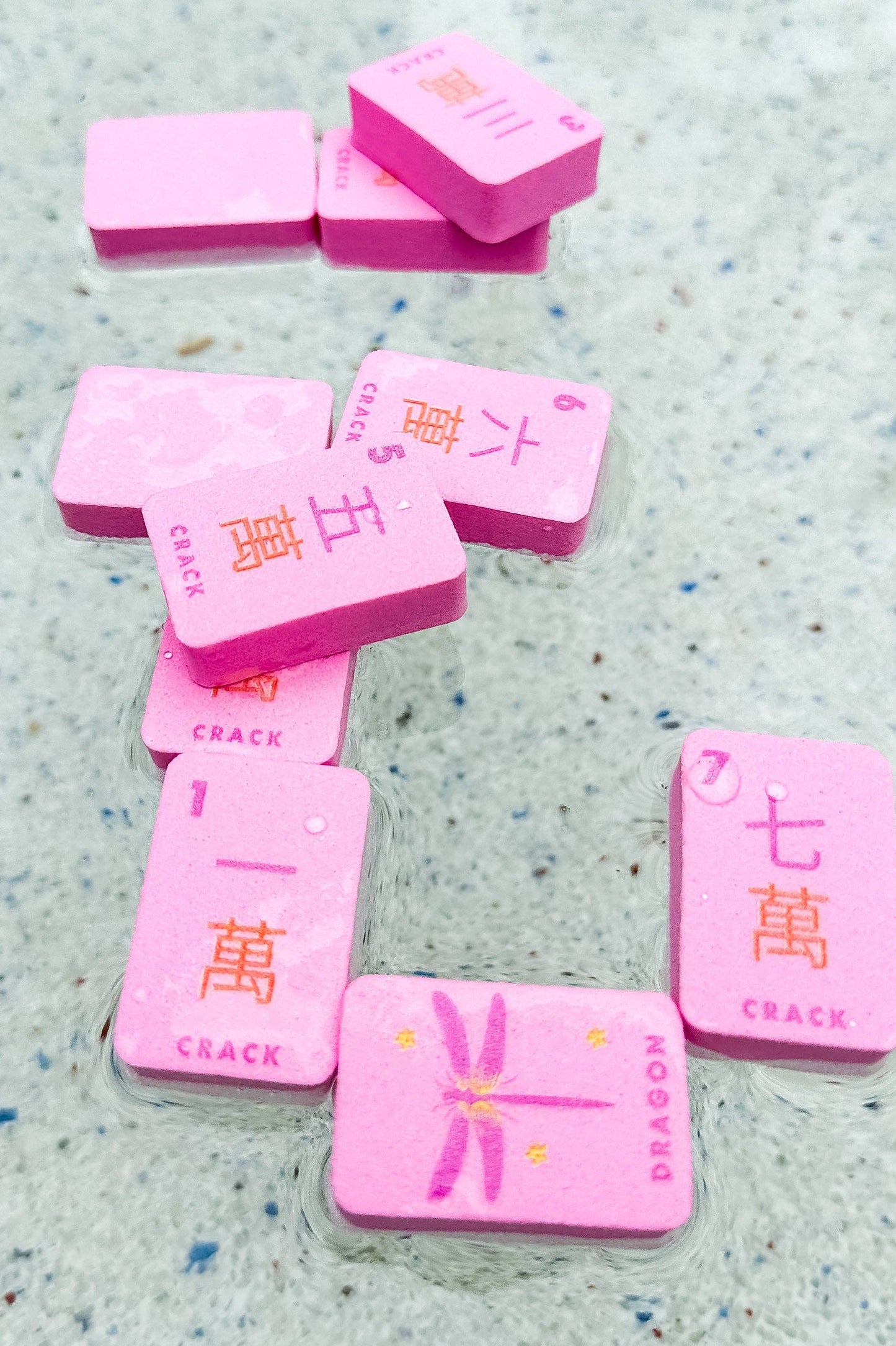 Floating Mahjong Tiles in Floral Pink for the Pool